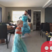 Father and son wear Elsa costumes, dance on Frozen song