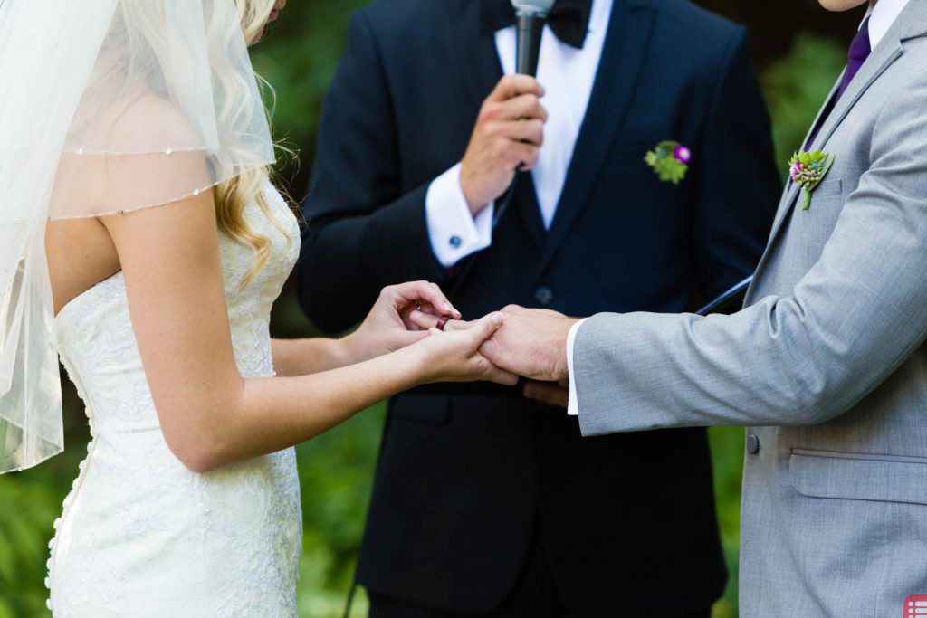 couple exchanging rings