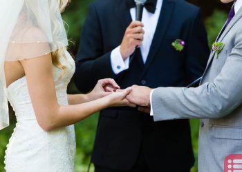 couple exchanging rings