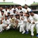 The Indian team poses for a photograph with the Border-Gavaskar Trophy as they celebrate a 2-1 series victory over Australia following play being abandoned in the fourth test match between Australia and India at the SCG in Sydney
