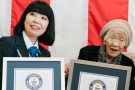Kane Tanaka with her certificate for oldest living person.