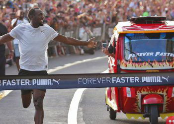 Usain Bolt Races Against a Taxi, and, Obviously, Wins!