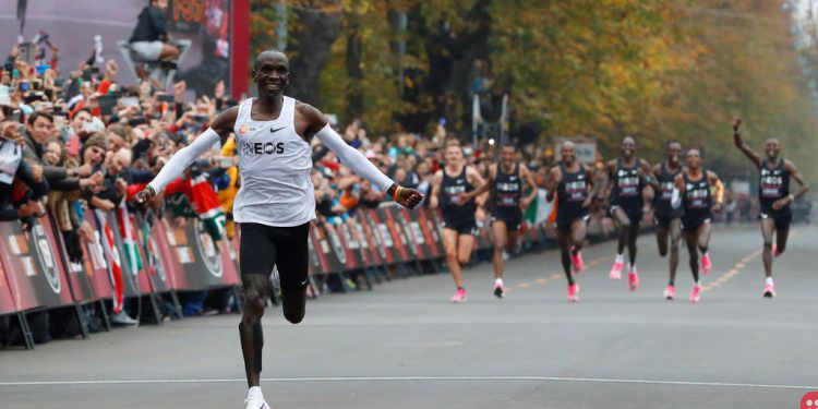 Kenyan Eliud Kipchoge becomes first to run a marathon in under 2 hours