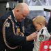 Firefighter’s posthumous medal presented to toddler son