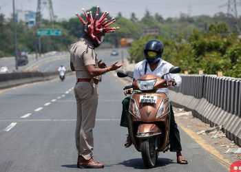 Indian cop wears ‘Coronavirus helmet’ to urge people to stay back home
