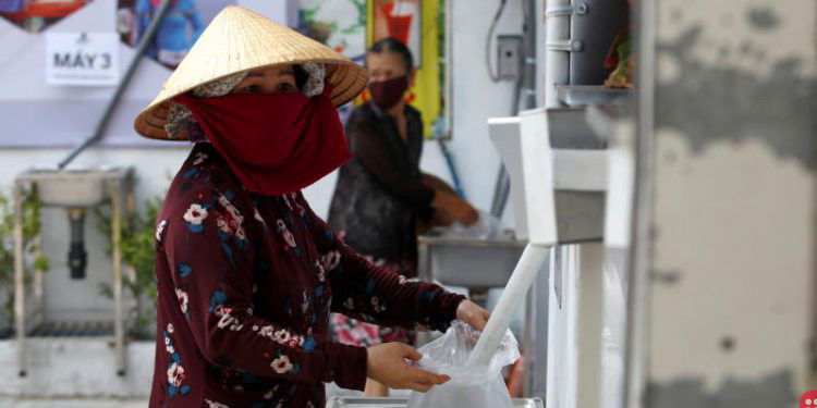 In Vietnam, ‘Rice ATMs’ provide free rice to people in need