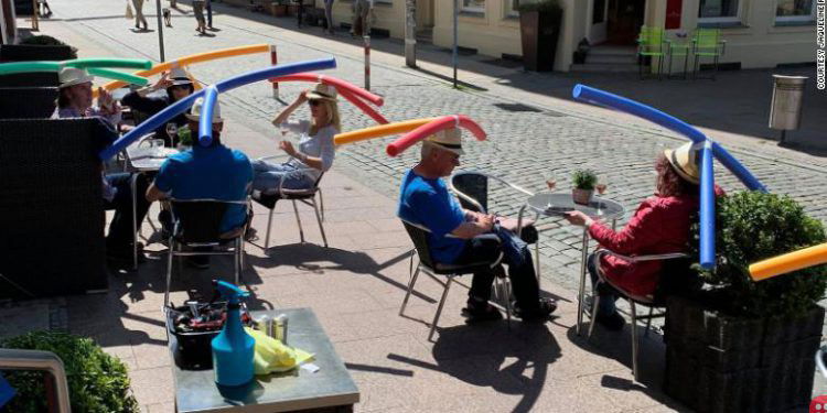 German cafe asks customers to wear pool-noodle hats to ensure social distancing