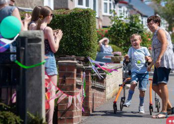 Tobias Weller, 9-year-old with cerebral palsy, completes marathon to raise money for charity