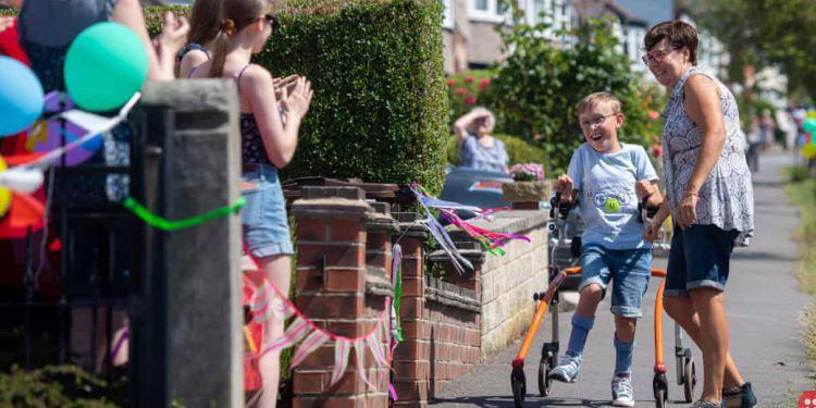 Tobias Weller, 9-year-old with cerebral palsy, completes marathon to raise money for charity