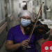 Chilean nurse plays violin for COVID-19 patients to soothe them