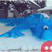 Canadian woman creates massive blue snow dragon in her driveway to spread cheer