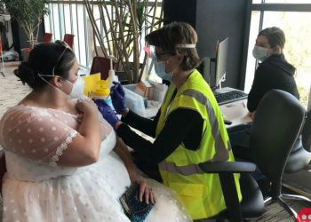 US Woman Gets Vaccinated in Her Unworn Wedding Dress!
