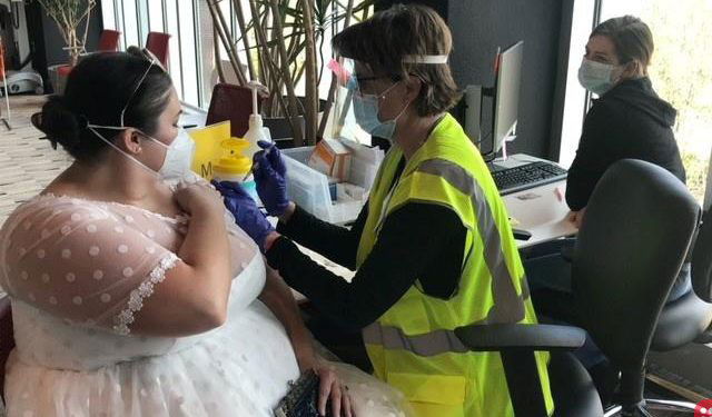 US Woman Gets Vaccinated in Her Unworn Wedding Dress!